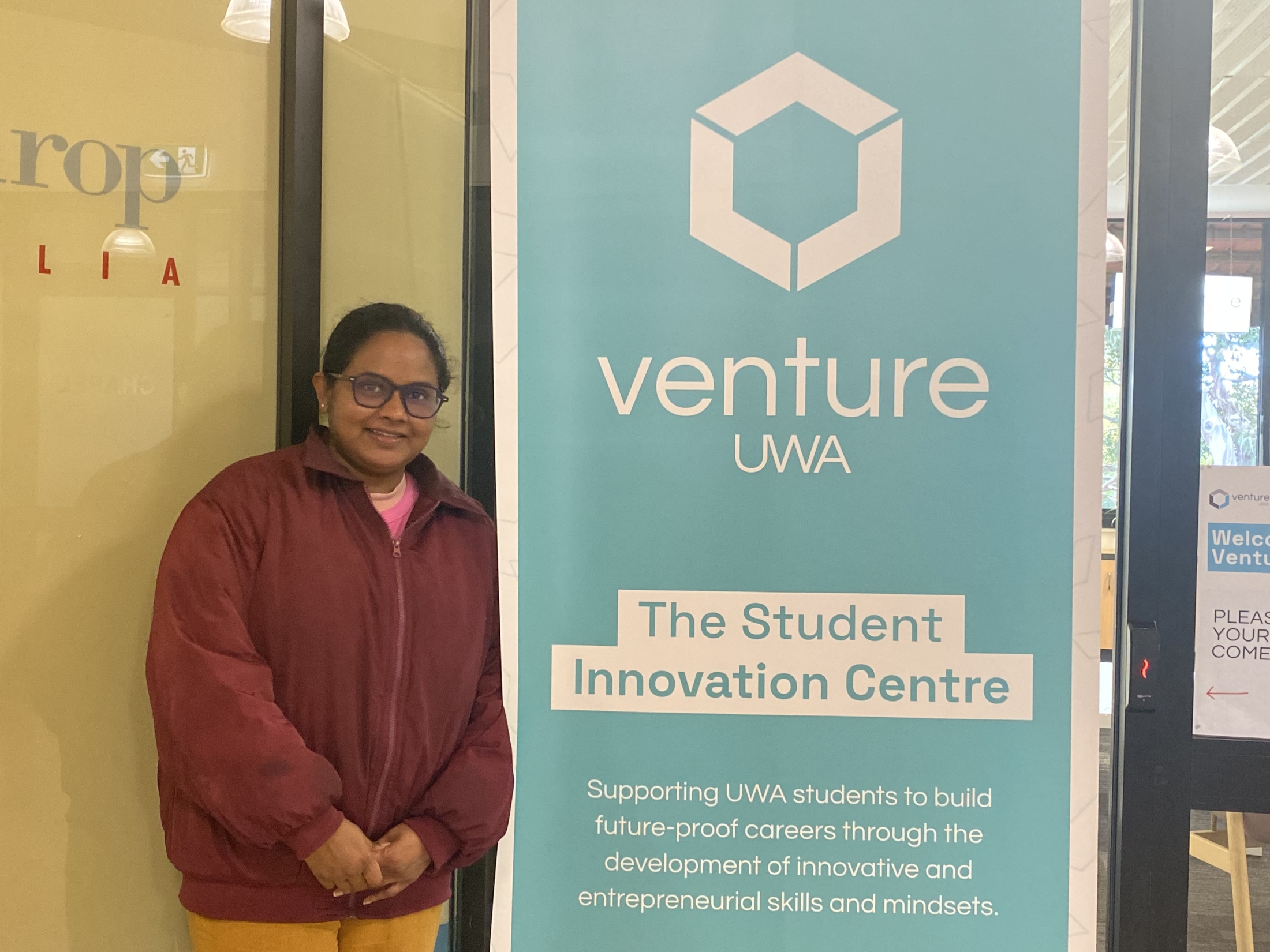 Image of Gayathri at the university supporting the university and new students as a facilitator.
