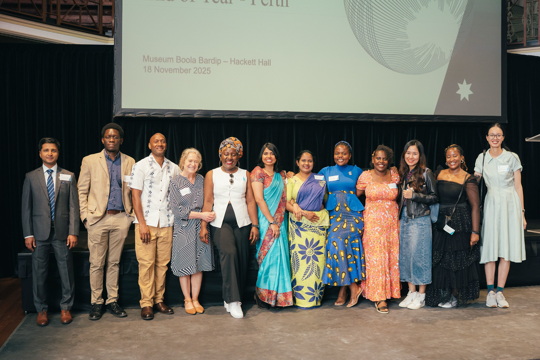 Gayathri (middle in yellow saree) pictured with other scholars from across regions at the 2025 Australia Awards End of Year Event.